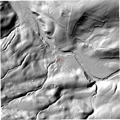 Shaded relief map of the ground around LA105QE, computed from Environment Agency LiDAR. The ground here sits at about 114 m above sea level and falls 170 m across the surrounding 800 m. Surface water reaching this point runs off ground lying to the south-south-west, 57.5 m higher.