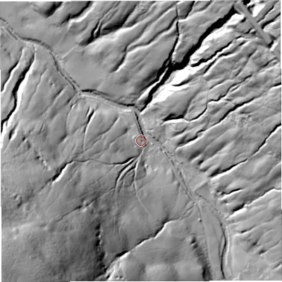 Shaded relief map of the ground around LA105RG, computed from Environment Agency LiDAR. The ground here sits at about 243 m above sea level and falls 145 m across the surrounding 800 m. Surface water reaching this point runs off ground lying to the south-west, 119.5 m higher.