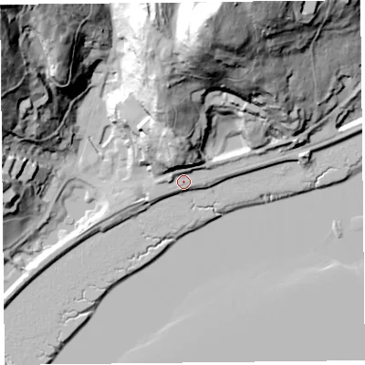 Shaded relief map of the ground around LA116DW, computed from Environment Agency LiDAR. The ground here sits at about 9 m above sea level and falls 75 m across the surrounding 800 m. Surface water reaching this point runs off ground lying to the north-north-west, 19.4 m higher.