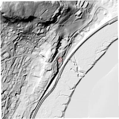Shaded relief map of the ground around LA116DX, computed from Environment Agency LiDAR. The ground here sits at about 13 m above sea level and falls 136 m across the surrounding 800 m. Surface water reaching this point runs off ground lying to the west-south-west, 14.3 m higher.