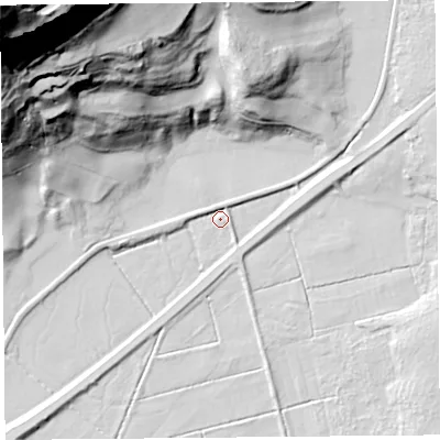 Shaded relief map of the ground around LA116SL, computed from Environment Agency LiDAR. The ground here sits at about 6 m above sea level and falls 125 m across the surrounding 800 m. Surface water reaching this point runs off ground lying to the east-north-east, 5.1 m higher.