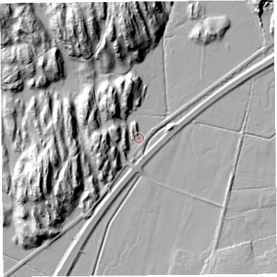 Shaded relief map of the ground around LA116SN, computed from Environment Agency LiDAR. The ground here sits at about 5 m above sea level and falls 32 m across the surrounding 800 m. Surface water reaching this point runs off ground lying to the west-north-west, 21.2 m higher.