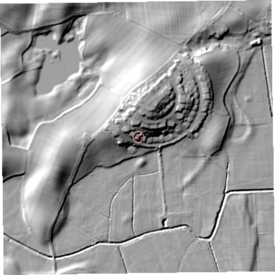 Shaded relief map of the ground around LA117LQ, computed from Environment Agency LiDAR. The ground here sits at about 13 m above sea level and falls 20 m across the surrounding 800 m. Surface water reaching this point runs off ground lying to the north-north-east, 12.2 m higher.