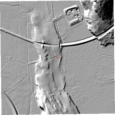 Shaded relief map of the ground around LA117LX, computed from Environment Agency LiDAR. The ground here sits at about 7 m above sea level and falls 57 m across the surrounding 800 m. Surface water reaching this point runs off ground lying to the north-west, 6.6 m higher.