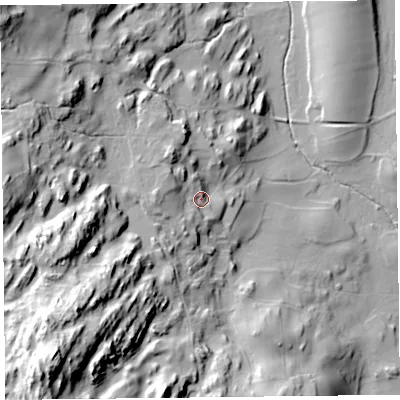 Shaded relief map of the ground around LA117SH, computed from Environment Agency LiDAR. The ground here sits at about 71 m above sea level and falls 57 m across the surrounding 800 m. Surface water reaching this point runs off ground lying to the west, 11.0 m higher.