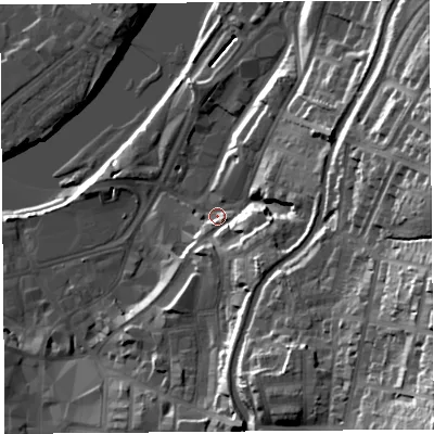 Shaded relief map of the ground around LA11DF, computed from Environment Agency LiDAR. The ground here sits at about 9 m above sea level and falls 48 m across the surrounding 800 m. Surface water reaching this point runs off ground lying to the south-east, 42.7 m higher.