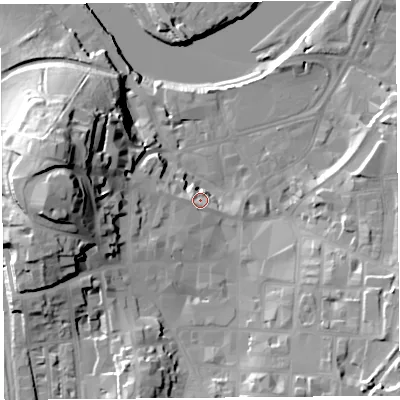 Shaded relief map of the ground around LA11LH, computed from Environment Agency LiDAR. The ground here sits at about 11 m above sea level and falls 38 m across the surrounding 800 m. Surface water reaching this point runs off ground lying to the west, 32.4 m higher.