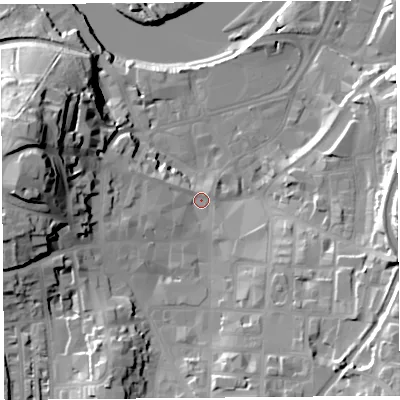 Shaded relief map of the ground around LA11LP, computed from Environment Agency LiDAR. The ground here sits at about 11 m above sea level and falls 38 m across the surrounding 800 m. Surface water reaching this point runs off ground lying to the west, 28.5 m higher.
