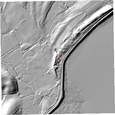 Shaded relief map of the ground around LA120RE, computed from Environment Agency LiDAR. The ground here sits at about 9 m above sea level and falls 10 m across the surrounding 800 m. Surface water reaching this point runs off ground lying to the west-south-west, 2.4 m higher.