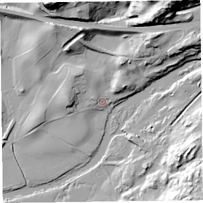 Shaded relief map of the ground around LA128AQ, computed from Environment Agency LiDAR. The ground here sits at about 10 m above sea level and falls 59 m across the surrounding 800 m. Surface water reaching this point runs off ground lying to the north-north-west, 22.9 m higher.