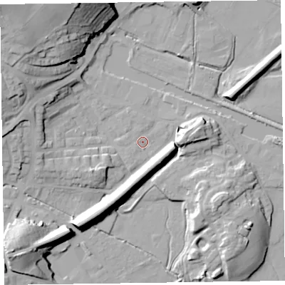 Shaded relief map of the ground around LA129AX, computed from Environment Agency LiDAR. The ground here sits at about 7 m above sea level and falls 26 m across the surrounding 800 m. Surface water reaching this point runs off ground lying to the north-west, 22.6 m higher.
