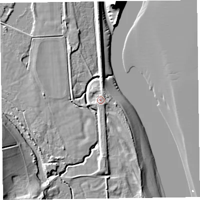 Shaded relief map of the ground around LA129QD, computed from Environment Agency LiDAR. The ground here sits at about 7 m above sea level and falls 27 m across the surrounding 800 m. Surface water reaching this point runs off ground lying to the north-north-east, 2.0 m higher.