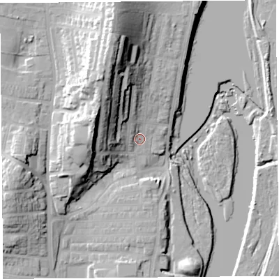 Shaded relief map of the ground around LA12DS, computed from Environment Agency LiDAR. The ground here sits at about 10 m above sea level and falls 34 m across the surrounding 800 m. Surface water reaching this point runs off ground lying to the north-north-west, 25.9 m higher.