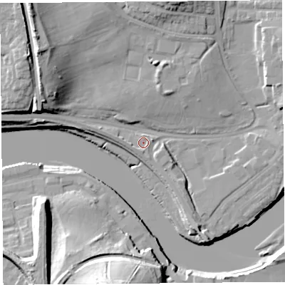 Shaded relief map of the ground around LA12RX, computed from Environment Agency LiDAR. The ground here sits at about 7 m above sea level and falls 27 m across the surrounding 800 m. Surface water reaching this point runs off ground lying to the south-east, 3.9 m higher.