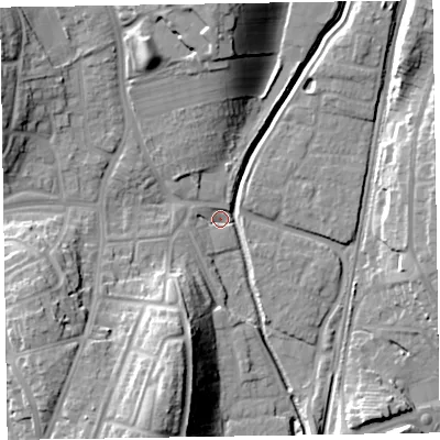 Shaded relief map of the ground around LA130BJ, computed from Environment Agency LiDAR. The ground here sits at about 6 m above sea level and falls 23 m across the surrounding 800 m. Surface water reaching this point runs off ground lying to the south-south-west, 21.4 m higher.