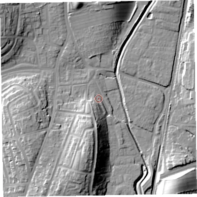 Shaded relief map of the ground around LA130BY, computed from Environment Agency LiDAR. The ground here sits at about 9 m above sea level and falls 23 m across the surrounding 800 m. Surface water reaching this point runs off ground lying to the south, 19.3 m higher.