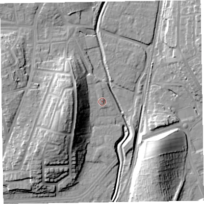 Shaded relief map of the ground around LA130DD, computed from Environment Agency LiDAR. The ground here sits at about 9 m above sea level and falls 23 m across the surrounding 800 m. Surface water reaching this point runs off ground lying to the west, 13.2 m higher.