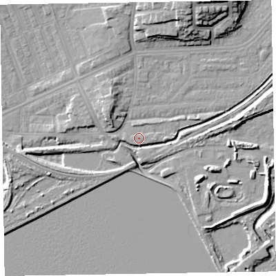Shaded relief map of the ground around LA130DN, computed from Environment Agency LiDAR. The ground here sits at about 7 m above sea level and falls 18 m across the surrounding 800 m. Surface water reaching this point runs off ground lying to the south, 2.2 m higher.