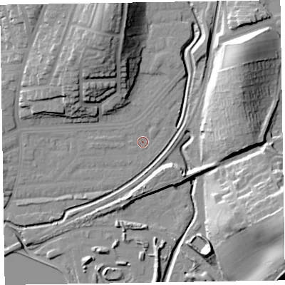Shaded relief map of the ground around LA130DT, computed from Environment Agency LiDAR. The ground here sits at about 6 m above sea level and falls 27 m across the surrounding 800 m. Surface water reaching this point runs off ground lying to the north-north-west, 21.0 m higher.