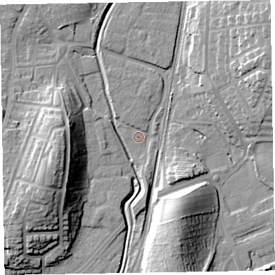 Shaded relief map of the ground around LA130DZ, computed from Environment Agency LiDAR. The ground here sits at about 7 m above sea level and falls 23 m across the surrounding 800 m. Surface water reaching this point runs off ground lying to the north, 1.8 m higher.