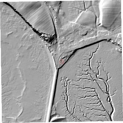 Shaded relief map of the ground around LA130PN, computed from Environment Agency LiDAR. The ground here sits at about 7 m above sea level and falls 16 m across the surrounding 800 m. Surface water reaching this point runs off ground lying to the north, 1.4 m higher.