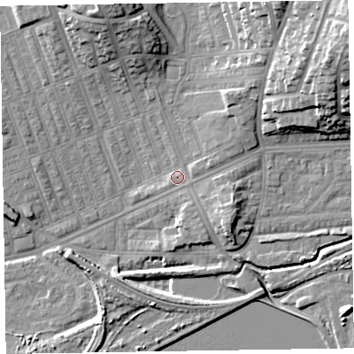 Shaded relief map of the ground around LA139RJ, computed from Environment Agency LiDAR. The ground here sits at about 7 m above sea level and falls 22 m across the surrounding 800 m. Surface water reaching this point runs off ground lying to the north-north-east, 13.3 m higher.