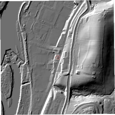 Shaded relief map of the ground around LA13PB, computed from Environment Agency LiDAR. The ground here sits at about 12 m above sea level and falls 45 m across the surrounding 800 m. Surface water reaching this point runs off ground lying to the east-north-east, 13.8 m higher.