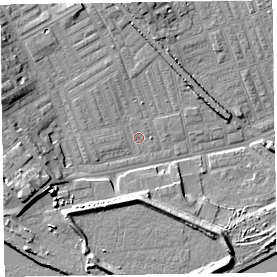 Shaded relief map of the ground around LA142AE, computed from Environment Agency LiDAR. The ground here sits at about 5 m above sea level and falls 12 m across the surrounding 800 m. Surface water reaching this point runs off ground lying to the west-north-west, 2.0 m higher.