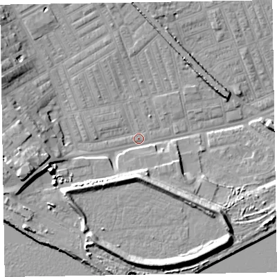 Shaded relief map of the ground around LA142AG, computed from Environment Agency LiDAR. The ground here sits at about 5 m above sea level and falls 12 m across the surrounding 800 m. Surface water reaching this point runs off ground lying to the west-south-west, 10.3 m higher.