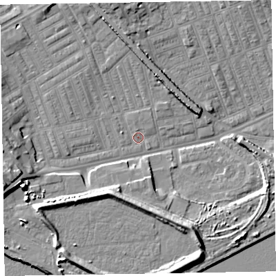 Shaded relief map of the ground around LA142AT, computed from Environment Agency LiDAR. The ground here sits at about 5 m above sea level and falls 12 m across the surrounding 800 m. Surface water reaching this point runs off ground lying to the west-south-west, 10.2 m higher.