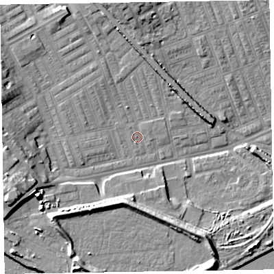 Shaded relief map of the ground around LA142AX, computed from Environment Agency LiDAR. The ground here sits at about 5 m above sea level and falls 12 m across the surrounding 800 m. Surface water reaching this point runs off ground lying to the north, 4.6 m higher.