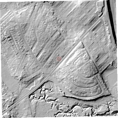 Shaded relief map of the ground around LA143DB, computed from Environment Agency LiDAR. The ground here sits at about 11 m above sea level and falls 18 m across the surrounding 800 m. Surface water reaching this point runs off ground lying to the north-east, 4.6 m higher.