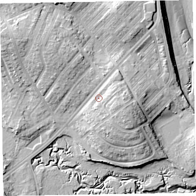 Shaded relief map of the ground around LA143DD, computed from Environment Agency LiDAR. The ground here sits at about 13 m above sea level and falls 19 m across the surrounding 800 m. Surface water reaching this point runs off ground lying to the east-north-east, 5.0 m higher.