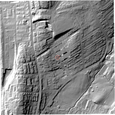 Shaded relief map of the ground around LA14HQ, computed from Environment Agency LiDAR. The ground here sits at about 53 m above sea level and falls 43 m across the surrounding 800 m. Surface water reaching this point runs off ground lying to the north-north-east, 15.3 m higher.