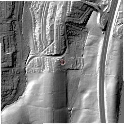 Shaded relief map of the ground around LA14LQ, computed from Environment Agency LiDAR. The ground here sits at about 60 m above sea level and falls 54 m across the surrounding 800 m. Surface water reaching this point runs off ground lying to the west, 3.0 m higher.