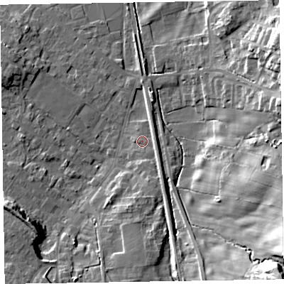 Shaded relief map of the ground around LA167AF, computed from Environment Agency LiDAR. The ground here sits at about 12 m above sea level and falls 29 m across the surrounding 800 m. Surface water reaching this point runs off ground lying to the south-south-east, 6.6 m higher.