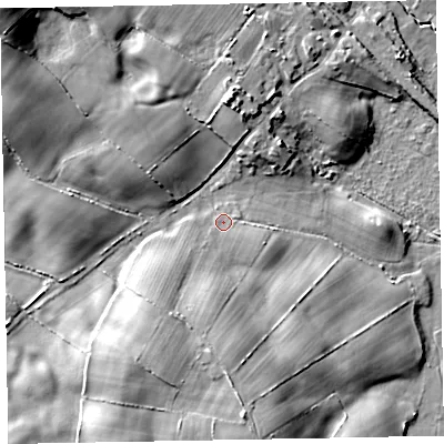 Shaded relief map of the ground around LA184NU, computed from Environment Agency LiDAR. The ground here sits at about 11 m above sea level and falls 19 m across the surrounding 800 m. Surface water reaching this point runs off ground lying to the south-south-west, 6.6 m higher.