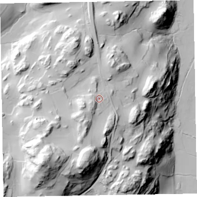 Shaded relief map of the ground around LA185HG, computed from Environment Agency LiDAR. The ground here sits at about 61 m above sea level and falls 91 m across the surrounding 800 m. Surface water reaching this point runs off ground lying to the south-west, 8.6 m higher.