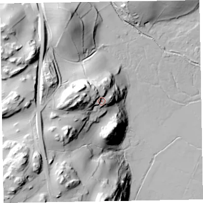 Shaded relief map of the ground around LA185HQ, computed from Environment Agency LiDAR. The ground here sits at about 35 m above sea level and falls 66 m across the surrounding 800 m. Surface water reaching this point runs off ground lying to the west, 24.8 m higher.