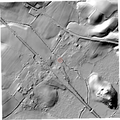 Shaded relief map of the ground around LA185LP, computed from Environment Agency LiDAR. The ground here sits at about 9 m above sea level and falls 26 m across the surrounding 800 m. Surface water reaching this point runs off ground lying to the west-south-west, 9.4 m higher.