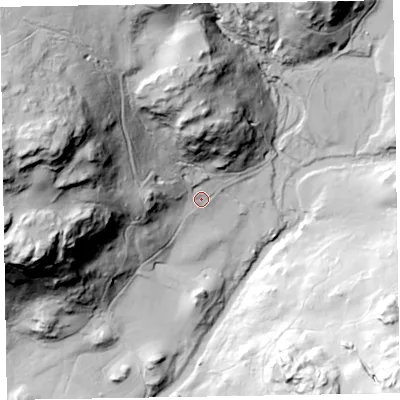 Shaded relief map of the ground around LA206DX, computed from Environment Agency LiDAR. The ground here sits at about 71 m above sea level and falls 133 m across the surrounding 800 m. Surface water reaching this point runs off ground lying to the west-north-west, 111.7 m higher.