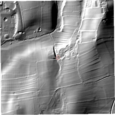 Shaded relief map of the ground around LA20AG, computed from Environment Agency LiDAR. The ground here sits at about 24 m above sea level and falls 52 m across the surrounding 800 m. Surface water reaching this point runs off ground lying to the east-north-east, 30.5 m higher.