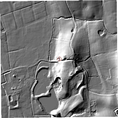Shaded relief map of the ground around LA20DX, computed from Environment Agency LiDAR. The ground here sits at about 11 m above sea level and falls 18 m across the surrounding 800 m. Surface water reaching this point runs off ground lying to the east, 12.4 m higher.