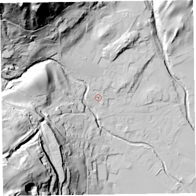 Shaded relief map of the ground around LA218DU, computed from Environment Agency LiDAR. The ground here sits at about 58 m above sea level and falls 106 m across the surrounding 800 m. Surface water reaching this point runs off ground lying to the north-west, 91.8 m higher.