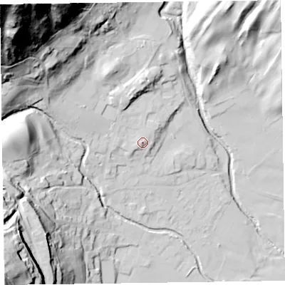 Shaded relief map of the ground around LA218DZ, computed from Environment Agency LiDAR. The ground here sits at about 59 m above sea level and falls 117 m across the surrounding 800 m. Surface water reaching this point runs off ground lying to the west, 2.7 m higher.