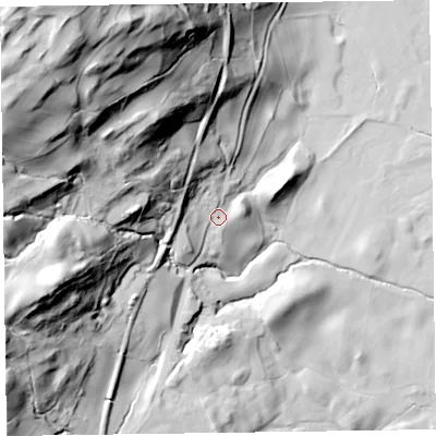Shaded relief map of the ground around LA218HB, computed from Environment Agency LiDAR. The ground here sits at about 70 m above sea level and falls 126 m across the surrounding 800 m. Surface water reaching this point runs off ground lying to the north-west, 103.5 m higher.