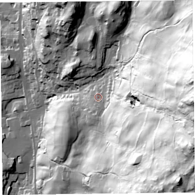 Shaded relief map of the ground around LA220AJ, computed from Environment Agency LiDAR. The ground here sits at about 87 m above sea level and falls 181 m across the surrounding 800 m. Surface water reaching this point runs off ground lying to the east-south-east, 139.0 m higher.