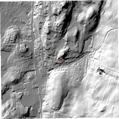 Shaded relief map of the ground around LA220AN, computed from Environment Agency LiDAR. The ground here sits at about 77 m above sea level and falls 148 m across the surrounding 800 m. Surface water reaching this point runs off ground lying to the north-east, 17.7 m higher.