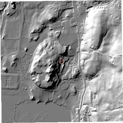 Shaded relief map of the ground around LA220AT, computed from Environment Agency LiDAR. The ground here sits at about 49 m above sea level and falls 80 m across the surrounding 800 m. Surface water reaching this point runs off ground lying to the west-south-west, 15.9 m higher.