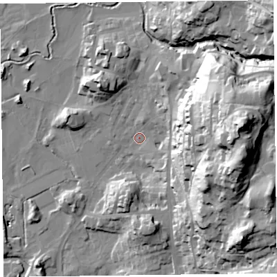 Shaded relief map of the ground around LA220BT, computed from Environment Agency LiDAR. The ground here sits at about 49 m above sea level and falls 74 m across the surrounding 800 m. Surface water reaching this point runs off ground lying to the east, 64.4 m higher.